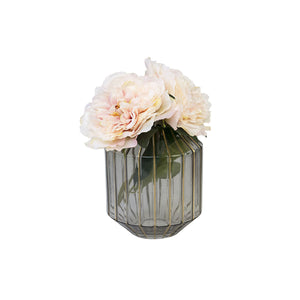 Clear Abbott Vase with white peonies and green leaves arrangement