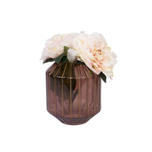 Photo of pink Abbott Vase with light pink peonies and green leaves floral arrangement