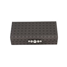 Top of Arden box with grey rattan pattern printed on dark grey faux leather and silver baubled hardware