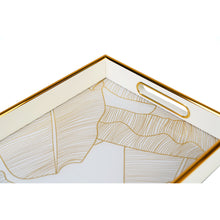 Detailed view of white & gold tray