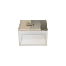Front of Brac box showing clear acrylic sides and sandy pattern on fabric lid in beige and olive