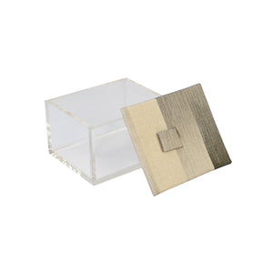 Front of open Brac box showing clear acrylic sides and sandy pattern on fabric lid in beige and olive