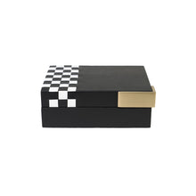 Front of black Campbell box with white checkered pattern on the side and gold hardware