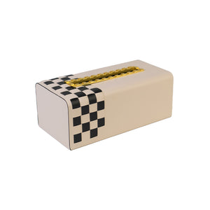Side of beige Campbell tissue box with black checkered pattern on the side and indented gold opening