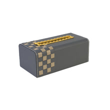 Side of grey Campbell tissue box with beige checkered pattern and indented gold opening