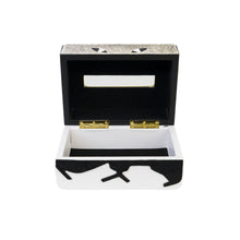 Front of open Carson tissue box showing black and white faux leather, gold hardware and black inner lining