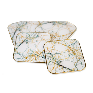 Detailed view of white & green coasters set