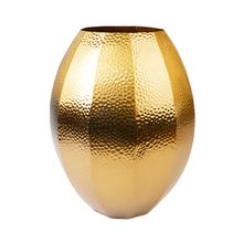 Front view of gold vase
