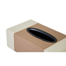 Detailed view of brown & beige tissue box