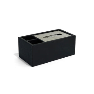 Side of Granada tissue box with black weave patterned leather, dark silver lid and two compartments lined in black suede