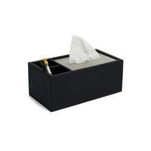 Side of filled Granada tissue box with black weave patterned leather, dark silver lid and two compartments lined in black suede holding pens