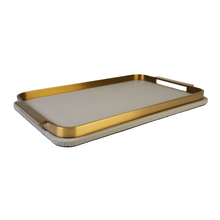 Side view of beige & gold tray