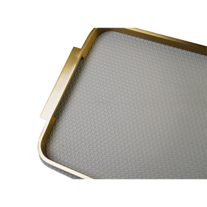 Detailed view of beige & gold tray