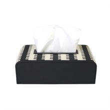 Tissue in black & white tissue box
