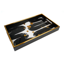 Top view of black & gold tray