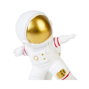 Detailed view of white & gold figurine