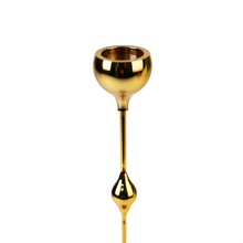 Detailed view of gold candle holder