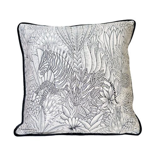Front view of cushion cover with black and white zebra in a jungle design