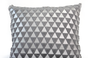 Closeup of front of Bijou grey cushion cover showing smooth texture of light silver fabric and furry texture of dark grey fabric