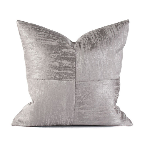 Front view of silver Allegra cushion cover showing its sleek silver and grey print, stitch detailing and sheen of fabric