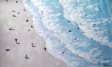By the Beach painting. Done in acrylic paint on canvas, depicting an aerial view of a beach with grey sand and light blue waves, with people surfing and playing in sand and ocean.