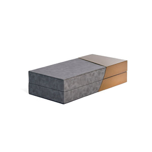Side view of Corsica box with smooth pebble grey faux leather and gold metal panels