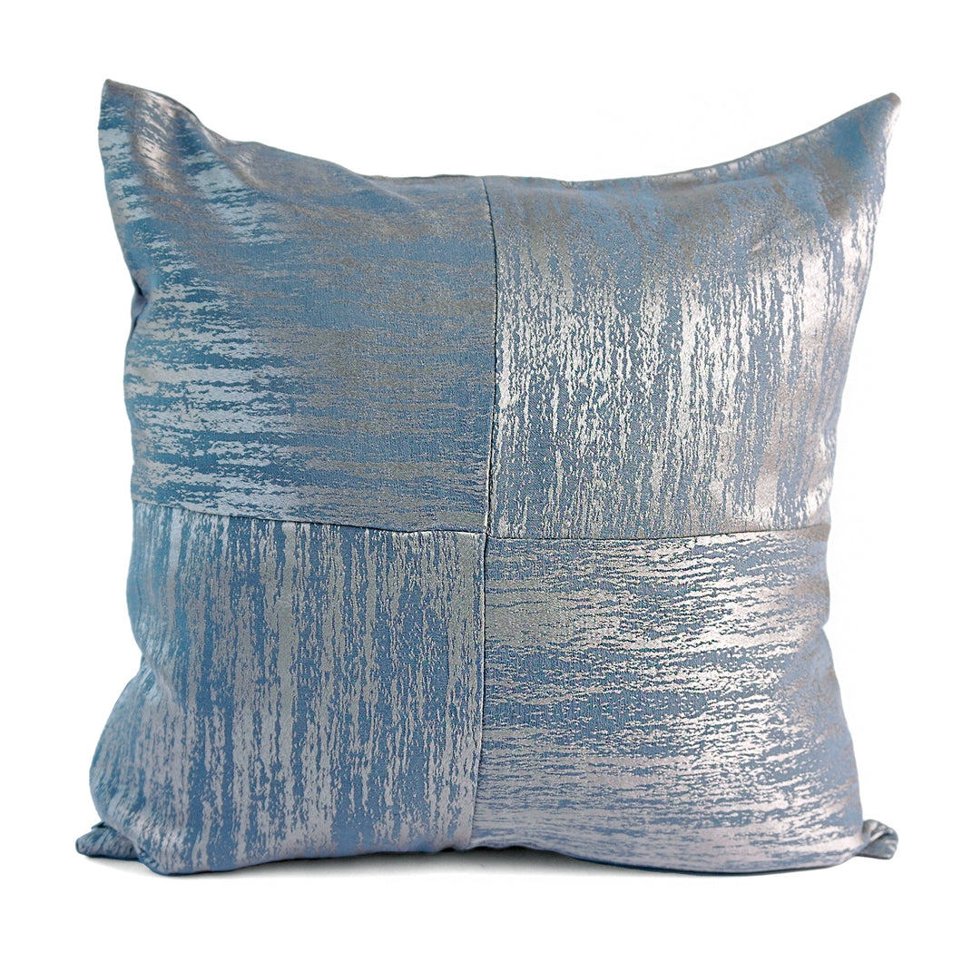 Front view of blue Allegra cushion cover, showing silver and blue textured print, stitch detailing and sheen of fabric