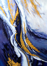 Closeup of abstract acrylic painting in shades of dark blue, white and gold on a vertical canvas